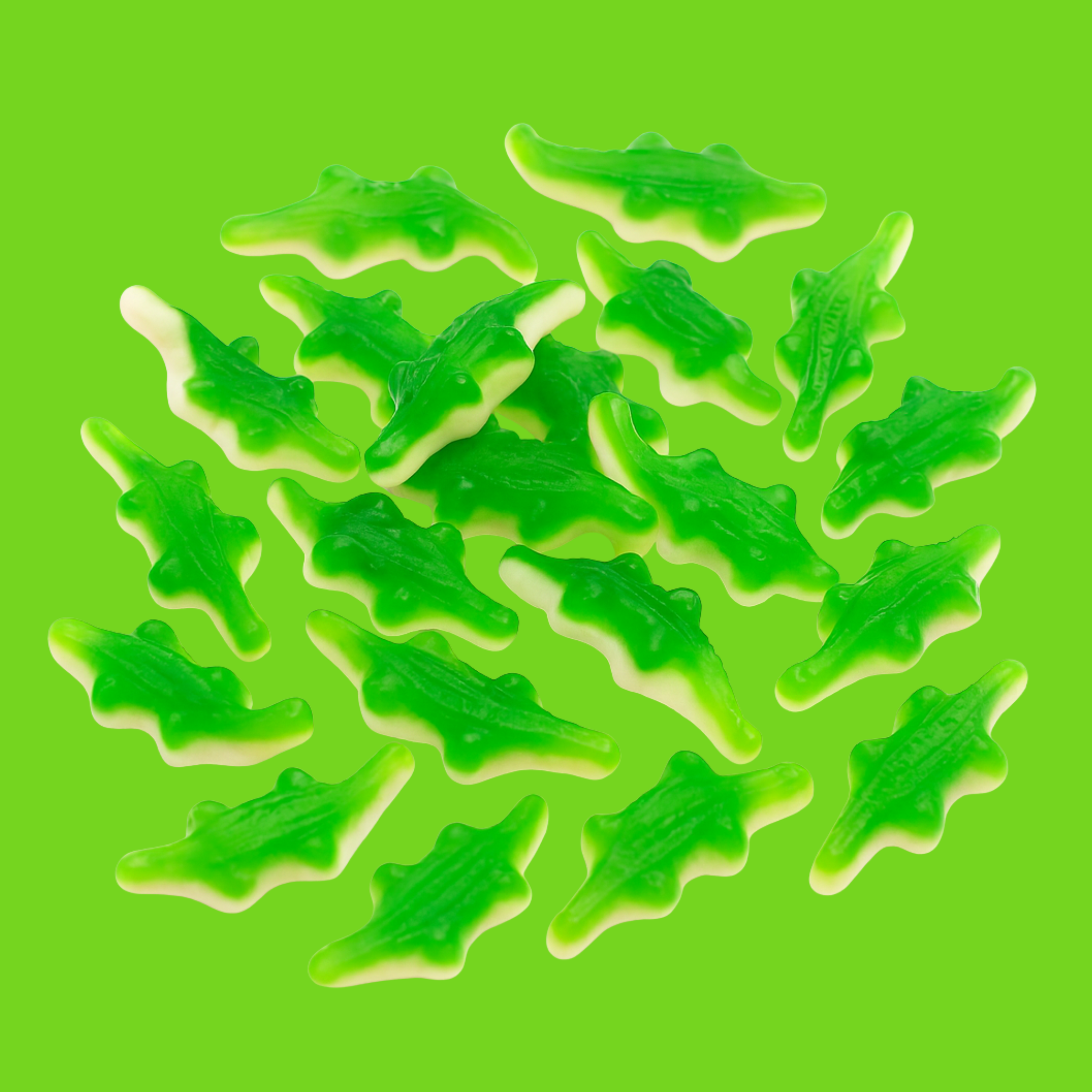 Halal jelly crocodiles against a green background.