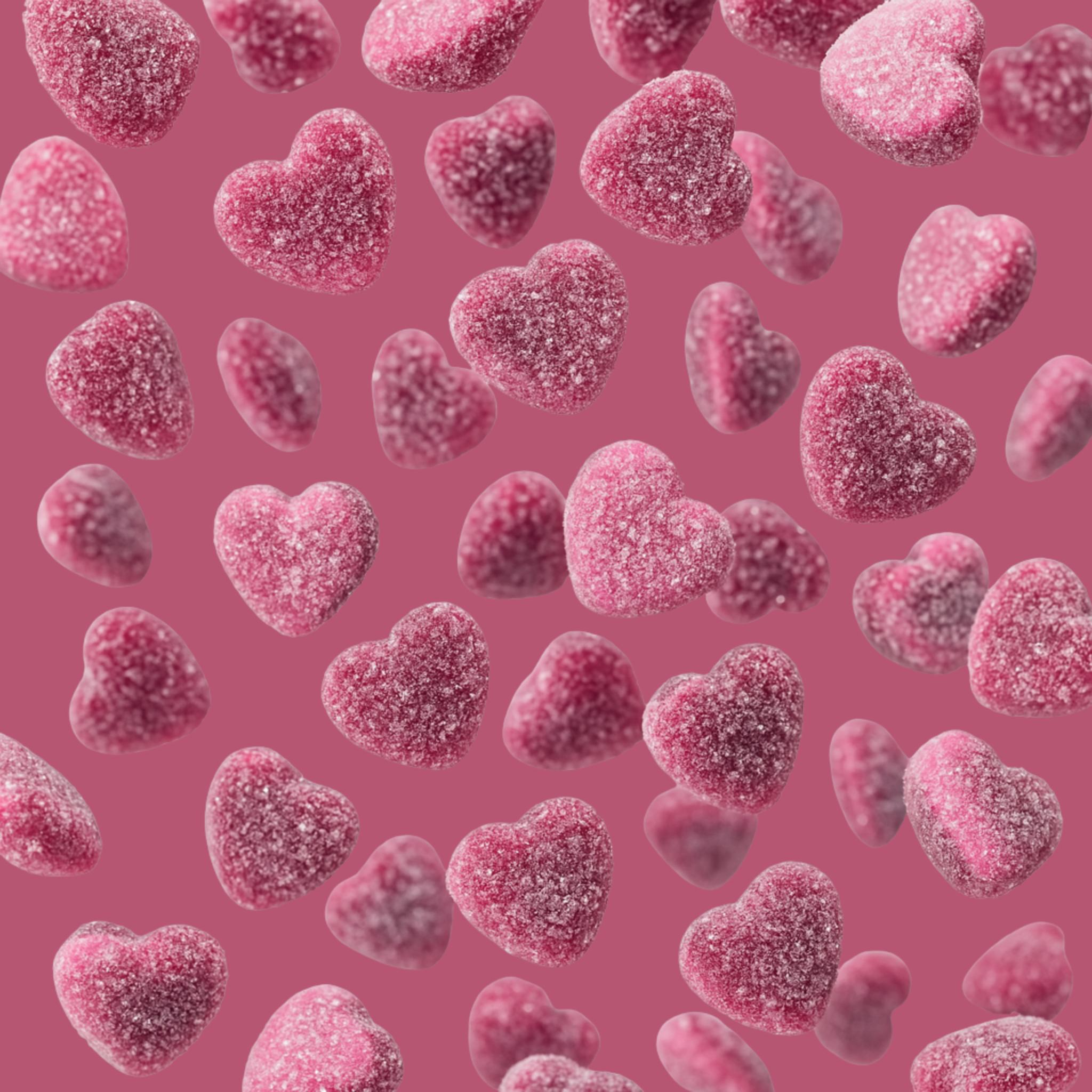 Halal fizzy strawberry hearts on a purple background.