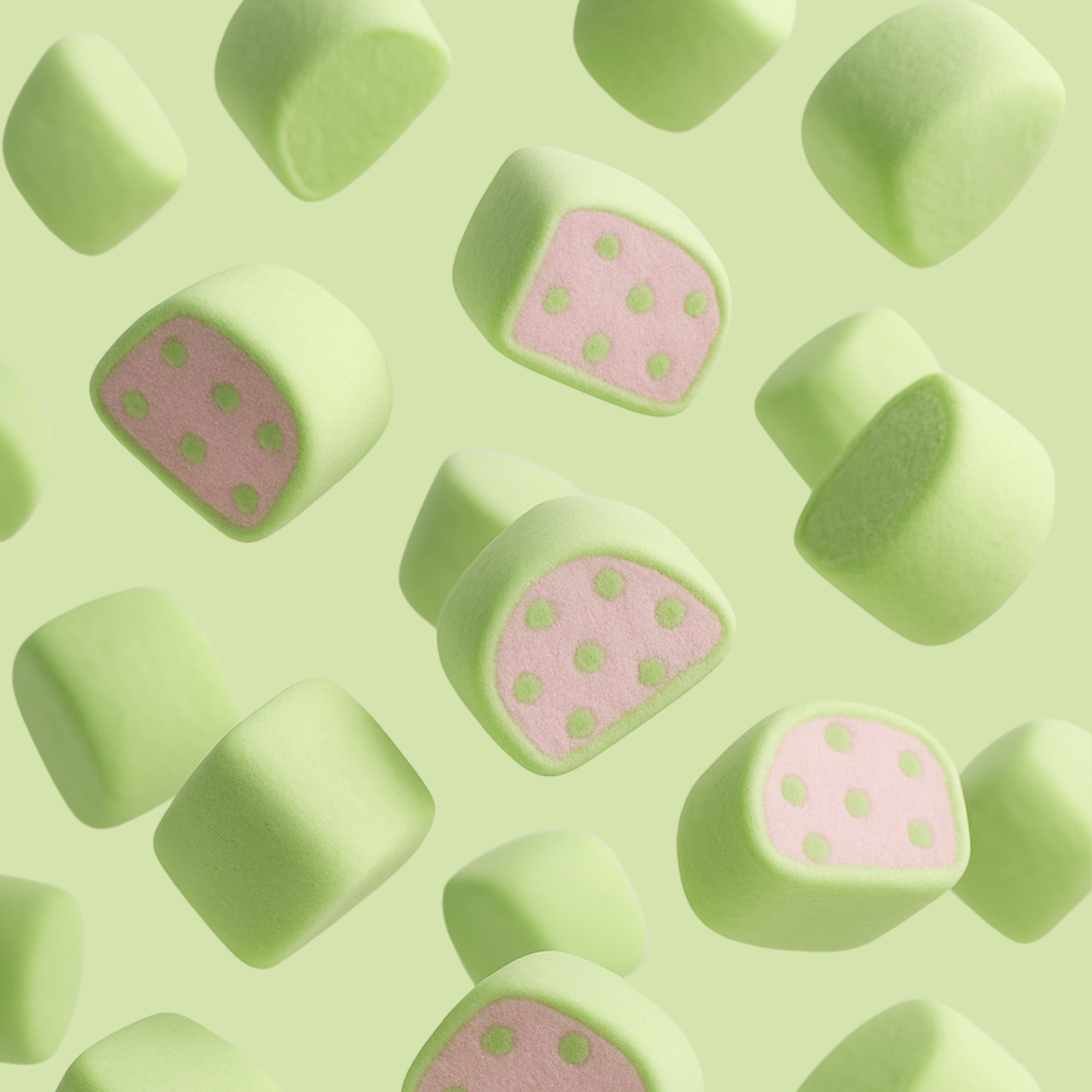 Halal watermelon marshmallows against a green background.